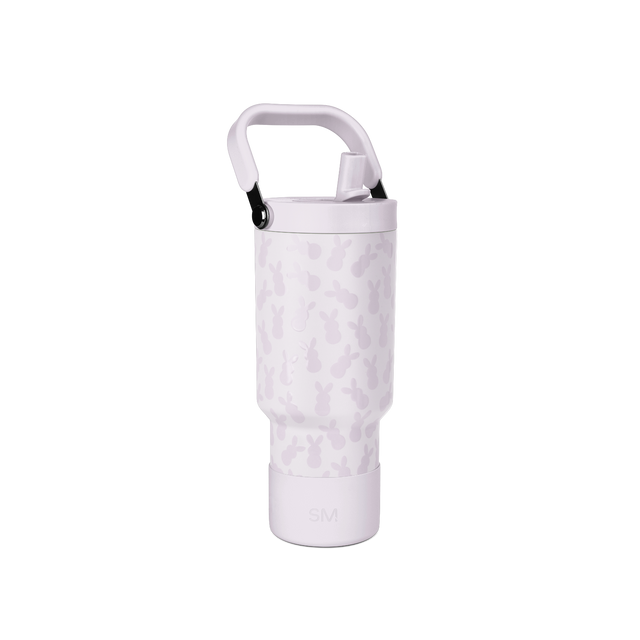 Light lavender water bottle with mauve camo pattern, white handle and rim, black accents Light lavender water bottle with mauve camo pattern, white handle and rim, black accents