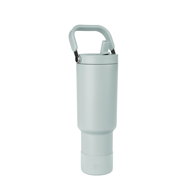 Sage green tumbler with black accents, featuring a modern minimalist design with soft muted tones and contemporary styling. Sage green tumbler with black accents, featuring a modern minimalist design with soft muted tones and contemporary styling.