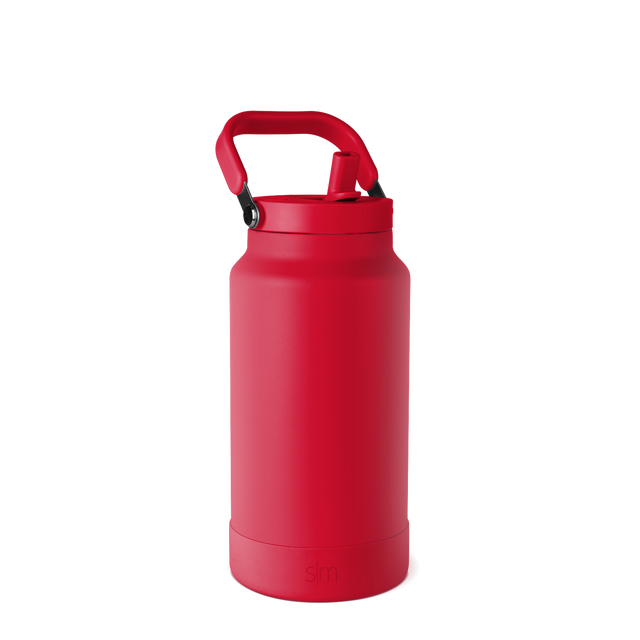 Vibrant coral-red insulated water bottle displayed against a white background. Vibrant coral-red insulated water bottle displayed against a white background.