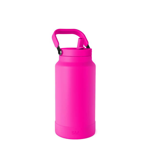 Hot pink water bottle against white background Hot pink water bottle against white background