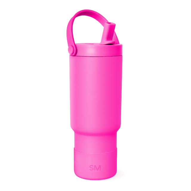 Vibrant hot pink insulated bottle with smooth surface finish, full view of cylindrical drinkware product against white background. Vibrant hot pink insulated bottle with smooth surface finish, full view of cylindrical drinkware product against white background.