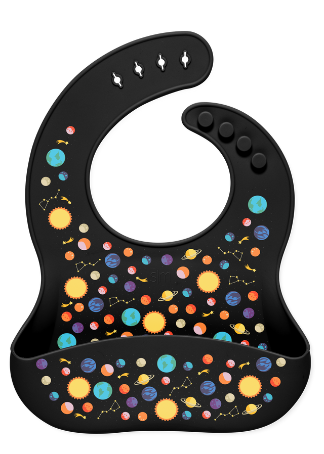 Black background with colorful celestial elements including bright yellow suns and stars, cyan and light blue planets, orange and coral circular shapes, and pink accents arranged in a decorative pattern Black background with colorful celestial elements including bright yellow suns and stars, cyan and light blue planets, orange and coral circular shapes, and pink accents arranged in a decorative pattern