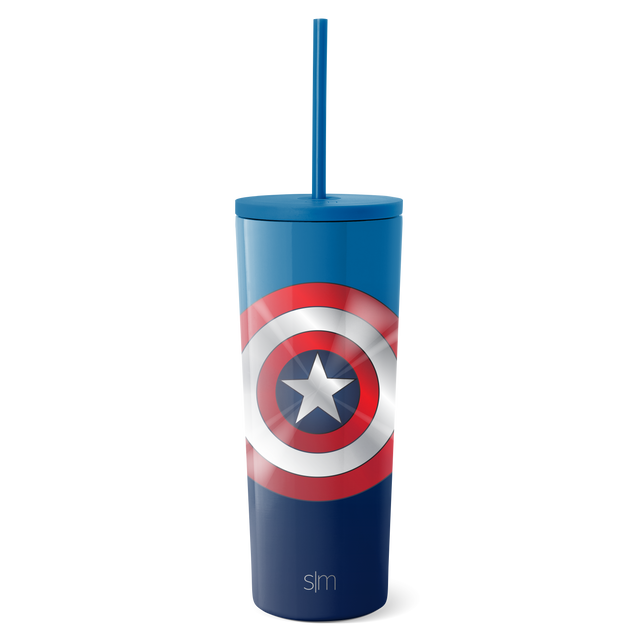 Simple Modern blue tumbler with lid and straw against white background Simple Modern blue tumbler with lid and straw against white background