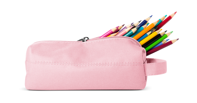 Soft pink pencil case with rainbow-colored pencils on white background Soft pink pencil case with rainbow-colored pencils on white background