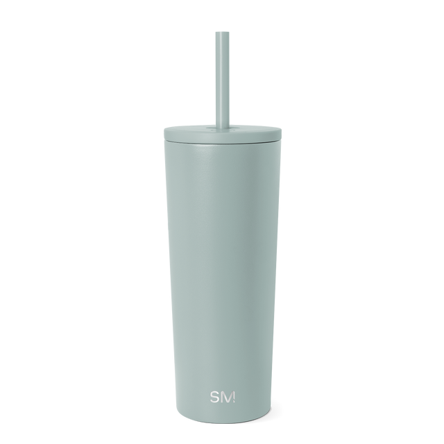 Sage green cylindrical tumbler with fitted lid and matching straw on white background. White 