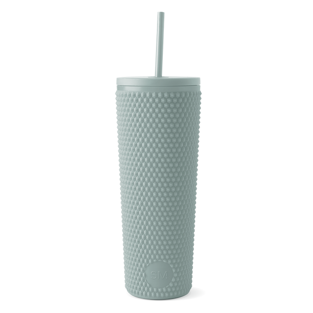 Soft sage green insulated tumbler with matching lid and straw, featuring a calm, muted eucalyptus green color throughout.
