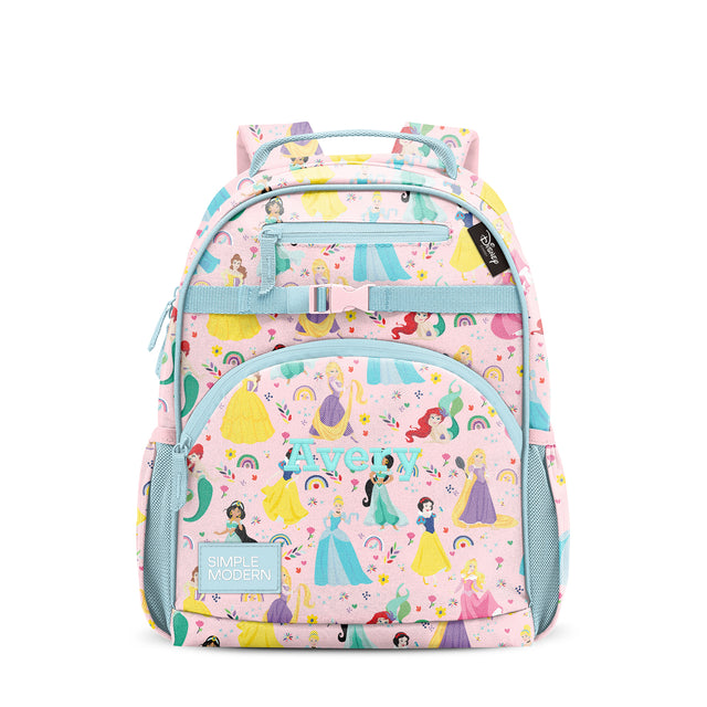 Pink Disney Princess children's backpack with turquoise straps, featuring multiple princesses in ball gowns, rainbows, stars, and castles. Multiple pockets with turquoise zippers and padded shoulder straps.