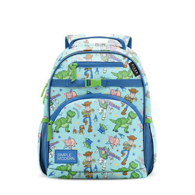 Light blue children's backpack with Toy Story characters including Woody, Buzz Lightyear, and aliens. Features navy blue straps and trim, lime green zipper accents, front curved pocket, and Simple Modern logo label.