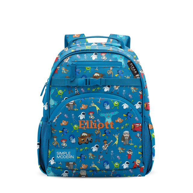 Bright blue Pixar character backpack with Nemo, Dory, Woody, and Buzz Lightyear graphics. Features multiple zippered compartments, padded straps, and 