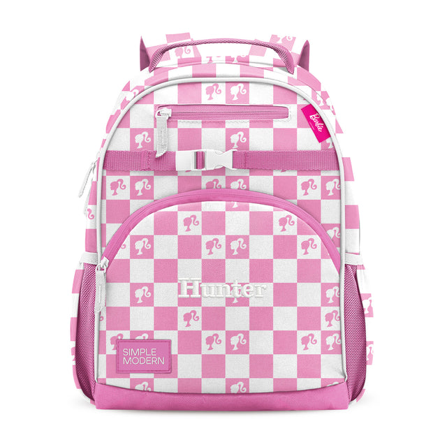 Pink and white children's backpack with purple horns on top, front zipper pockets, padded straps, carabiner clip, and 