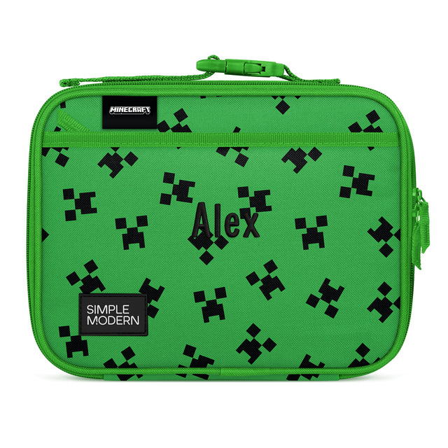 Lime green Minecraft-themed lunch case by Simple Modern with black creeper faces and diamond patterns, green handle and zipper, labeled 