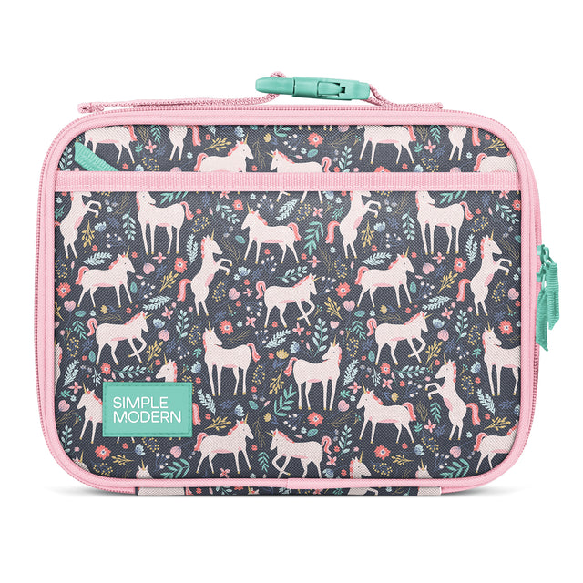 Pink and gray soft-sided insulated lunch box with deer and llama pattern, mint green handle and zipper pull, decorated with illustrated flowers and botanical elements in coral, turquoise, and yellow tones.