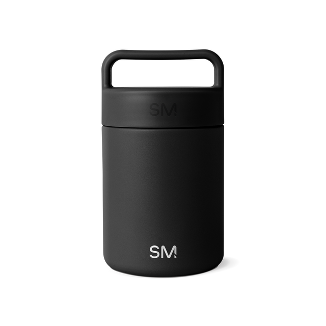 Matte black ceramic mug on white background, showcasing minimalist design and smooth finish