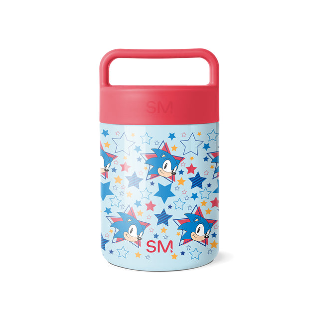 Simple Modern insulated food jar with coral pink lid and light blue body featuring animated blue character with spiky quills surrounded by colorful stars in a repeating pattern. Includes carrying handle.