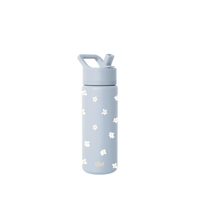 Blue-gray glass bottle with scattered white and pale yellow flower motifs on the surface.