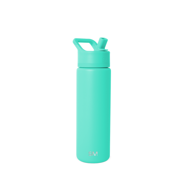 Bright turquoise seafoam green bottle against clean white background