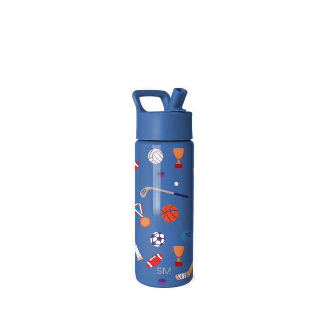Royal blue water bottle with carrying handle and flip-cap spout, featuring colorful sports-themed pattern with basketball, soccer ball, football, and other athletic icons in orange, red, and purple tones.