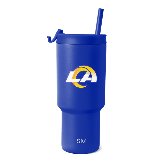 Royal blue tumbler with white and gold logo accents on clean white background