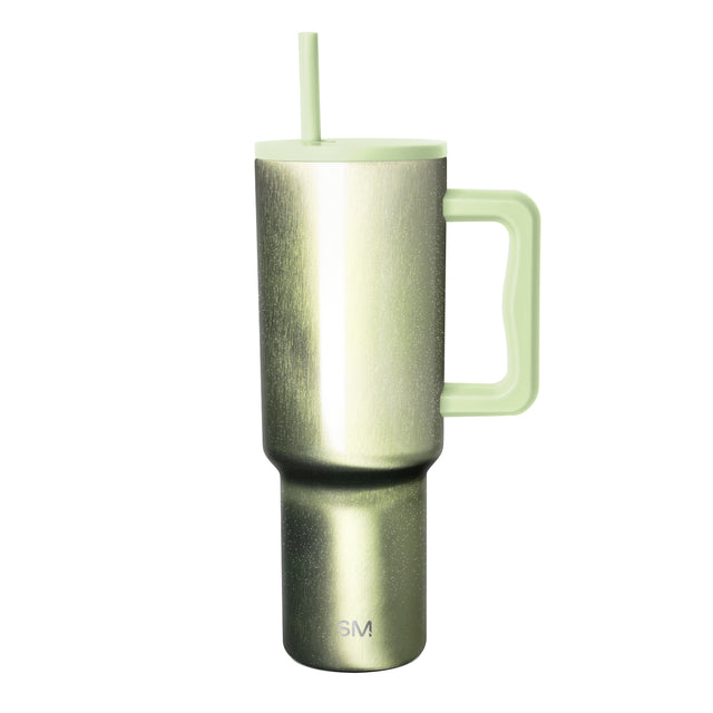 Insulated tumbler with metallic gradient finish transitioning from charcoal gray to sage green, matching lid and reusable straw, curved handle, Simple Modern logo, white background.