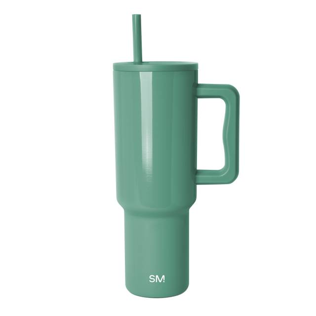 Sage green semi-gloss tumbler with smooth cylindrical body and subtle light reflections
