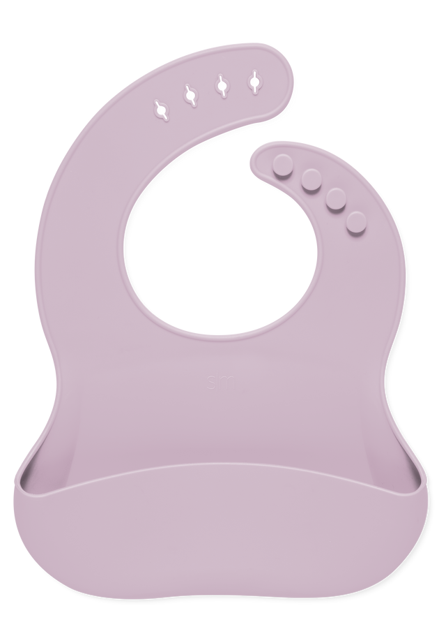 Soft mauve pink baby bib on white background