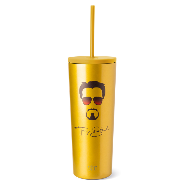 Golden yellow tumbler with matching straw, dark brown and black illustrated facial features